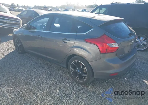 2012 Ford Focus Titanium z USA, uszkodzony, nr VIN 1FAHP3N25CL225033